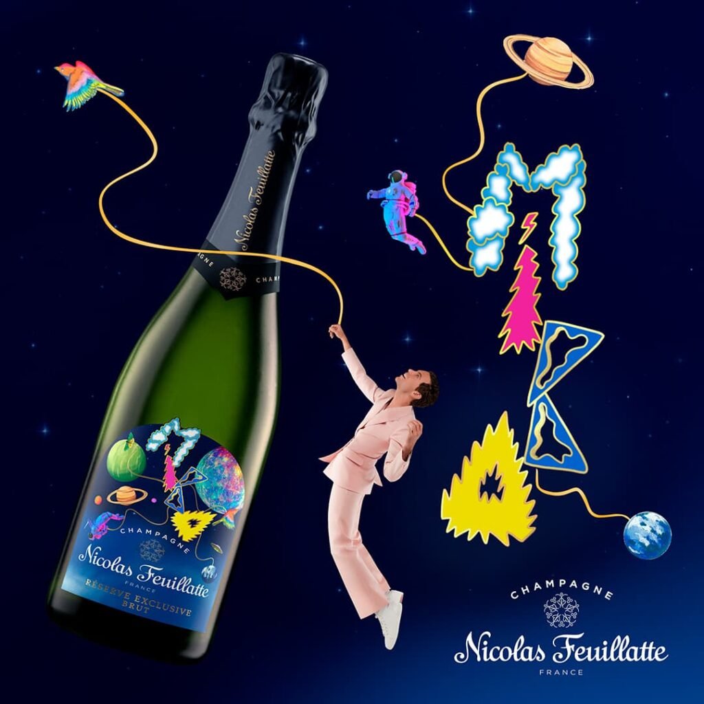 limited edition di Nicolas Feuillatte illustrata da Mika, Mika veste una bottiglia di Nicolas Feuillatte