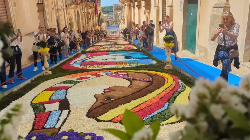 Infiorata di Noto 2026 cultura pop via Nicolaci barocco UNESCO, Noto, la capitale del barocco siciliano che rinasce ogni maggio