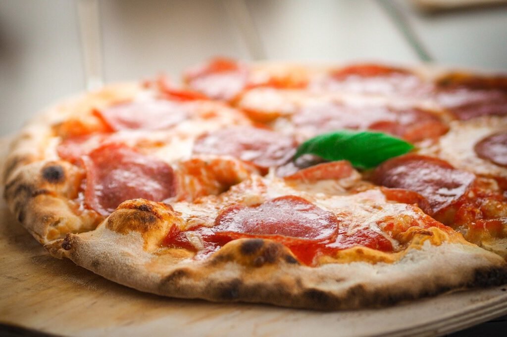#Pizza: quando mangiare ci rende… felici